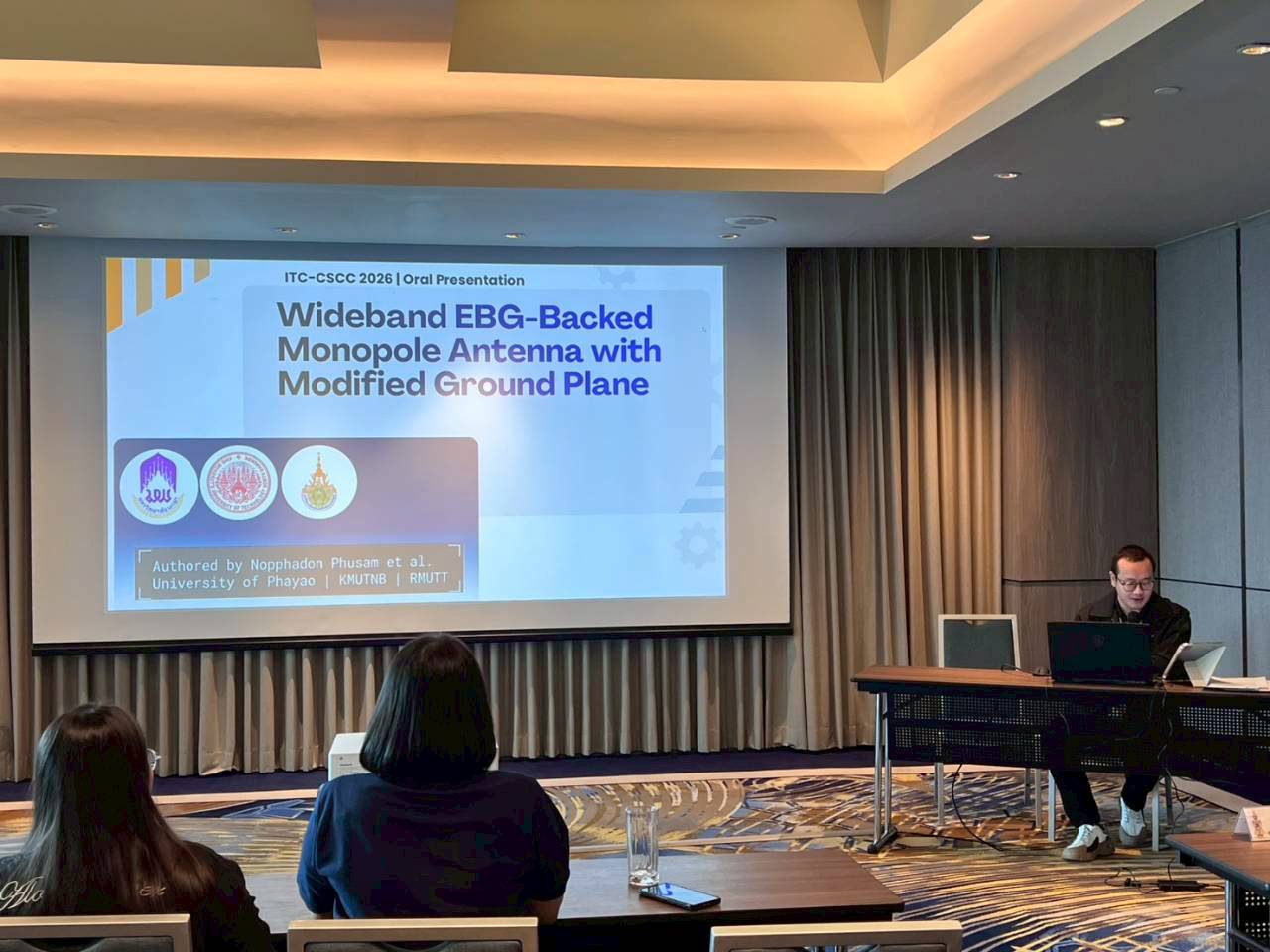 Title slide reading Wideband EBG-Backed Monopole Antenna with Modified Ground Plane at an ITC-CSCC 2026 oral session